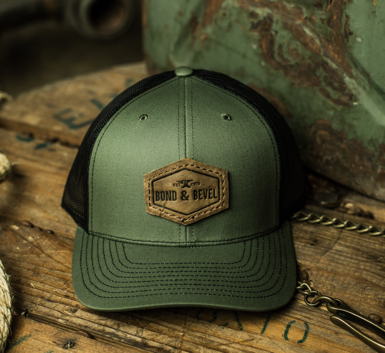 Leather Patch Trucker Hat in Military Olive
