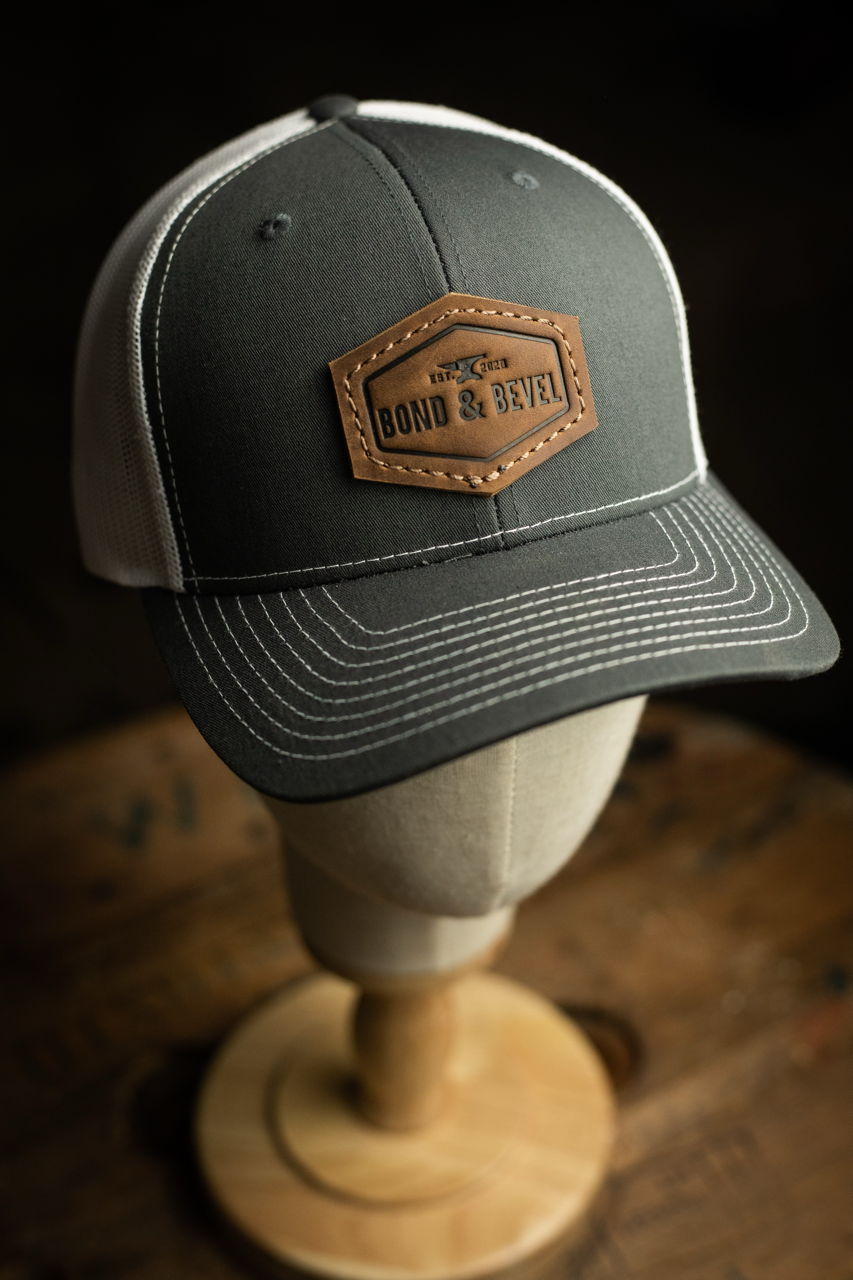 Leather Patch Trucker Hat in Charcoal