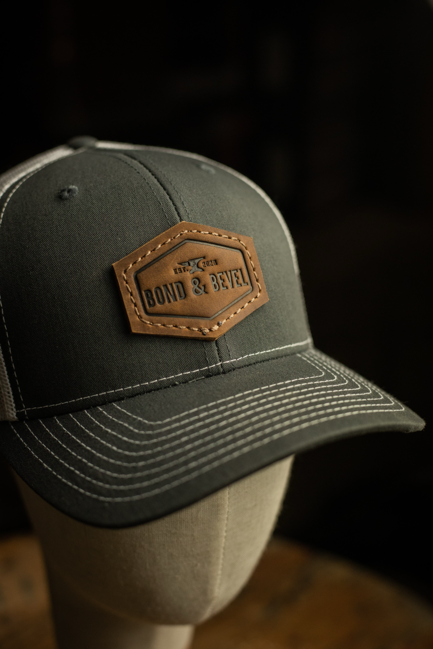 Leather Patch Trucker Hat in Charcoal